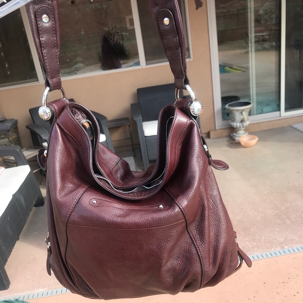 B makowsky.  Cognac leather.